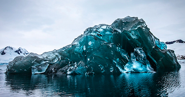Extraordinary Photos Of A Rare Flipped Iceberg In Antarctica