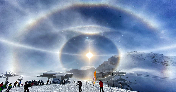 Man Photographs "Ice Halo" Around The Sun In Swiss Alps