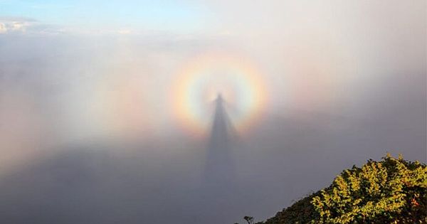 This Rare Optical Sight Called 'Brocken Spectre' Occurs When Your Shadow Is Cast Upon A Cloud Opposite A strong Light Source