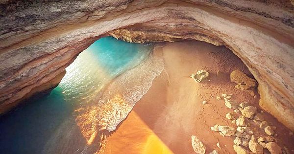 An Amazing Hidden Cave In Portugal With A Skylight And A Beach That You Can Only Get To By Boat (Video & Pictures)