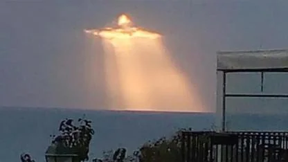 Glowing figure in the clouds stuns Italy as man captures Christ the Redeemer–like vision at sunset