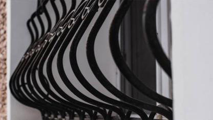 Why Do Some Window Grills Curve at the Bottom? The Surprising Reason Most Homeowners Don’t Know