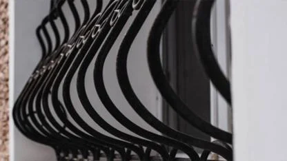 Why Do Some Window Grills Curve at the Bottom? The Surprising Reason Most Homeowners Don’t Know